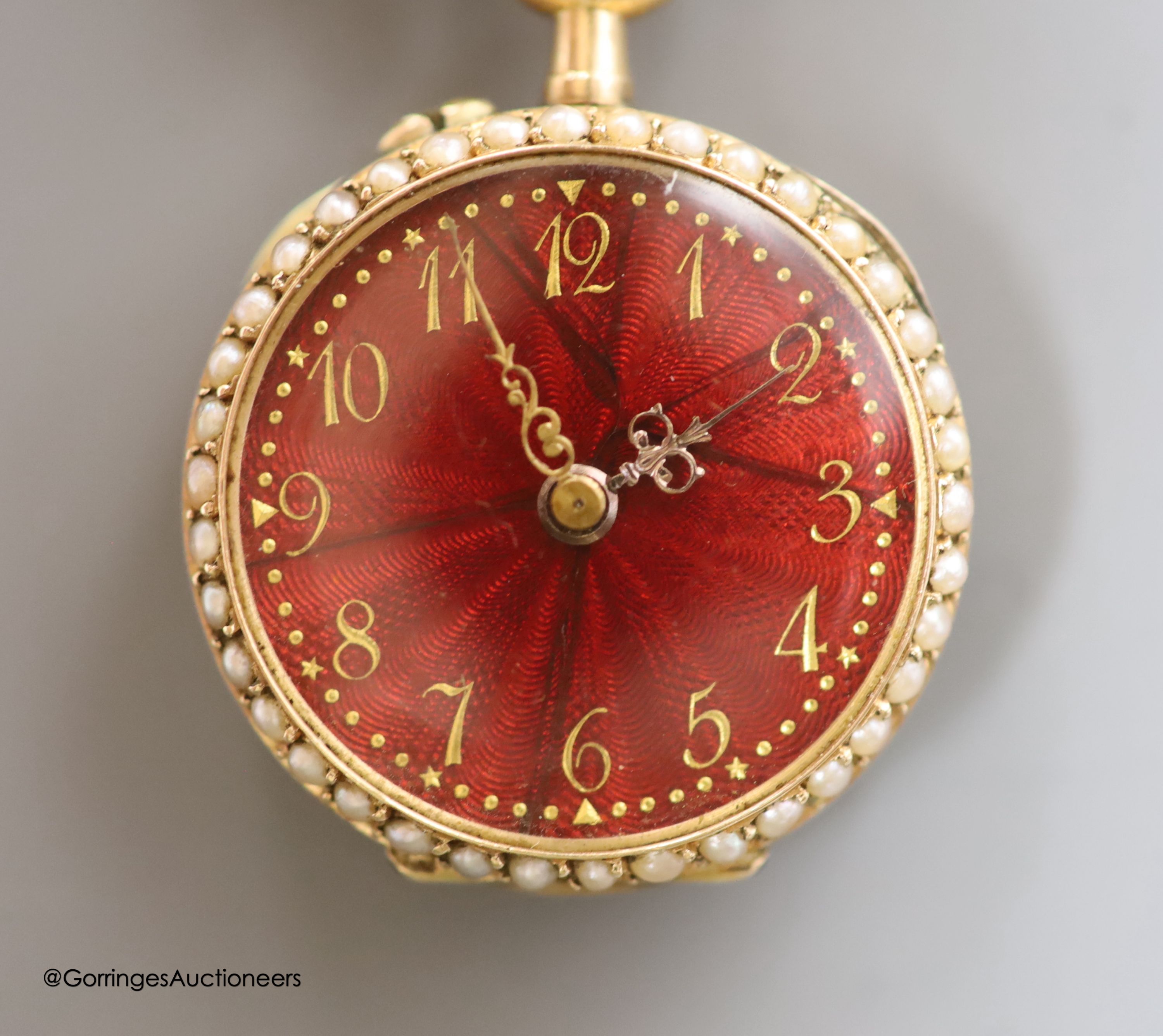 A lady's early 20th century 14k yellow metal, red enamel and seed pearl set fob watch(a.f.), case diameter 26mm, gross 15.5 grams, on a 9ct and red enamel bow brooch, gross 4.6 grams.